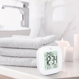 Reloj despertador compacto con temperatura y fecha image